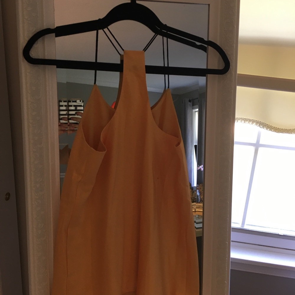 Yellow silk feel to it, tank top